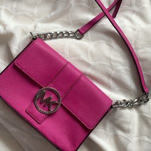 fuchsia pink Michael Kors crossbody bag